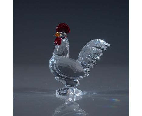 This exquisite Swarovski Silver Crystal Rooster figurine captures the proud stance and intricate details of the beloved barny