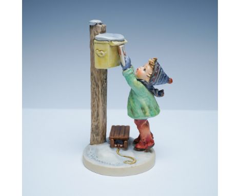 Charming Goebel Hummel figurine depicting a young child in a winter outfit reaching up to mail a letter to Santa. Hand-painte