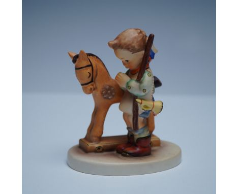 Goebel Hummel figurine titled Prayer Before Bath, depicting a young child standing in a moment of contemplation. This endeari