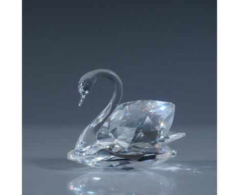 Exquisite Swarovski Silver Crystal swan figurine, a classic representation of the brand's iconic elegance. Expertly faceted, 