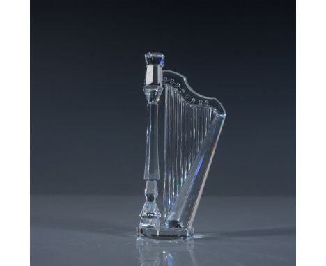 A stunning Swarovski crystal harp figurine, model number 169245, meticulously crafted with precision-cut clear crystal. Desig