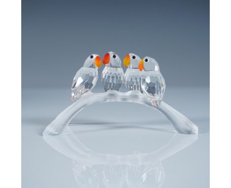 This lovely figurine features four baby lovebirds sitting on a branch and was part of the Feathered Beauties theme. The facet