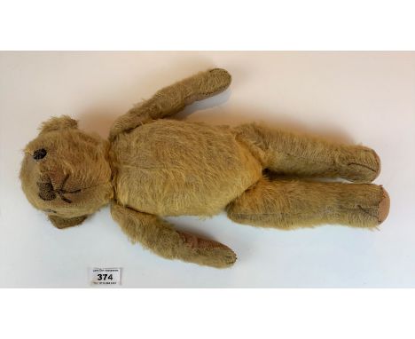 Antique teddy bear 15” long.