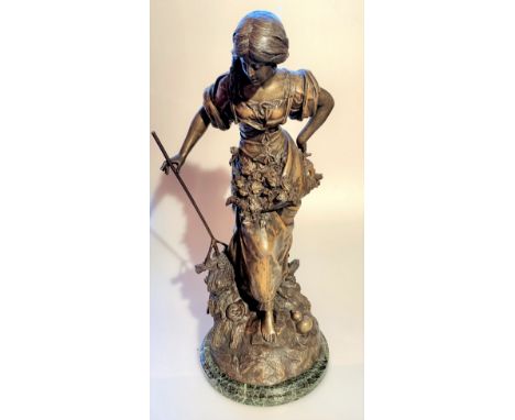 Large metal figure of woman on marble base. Holes in back been made for lamp. Named Maceau. Made in France stamp. 26” high