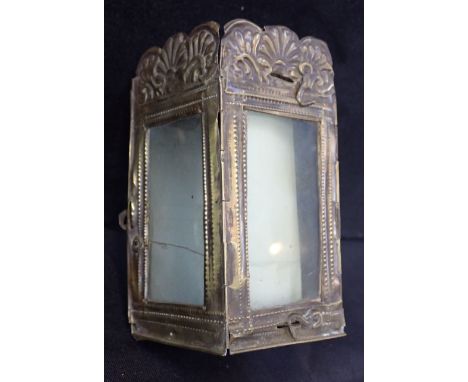 AN 18TH CENTURY BRASS 'SEDAN CHAIR' LAMP embossed with flowers and leaves, with three glazed sides (one side lacking glass), 