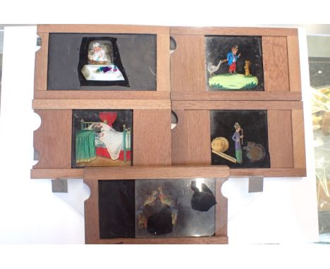 FIVE MECHANICAL MAGIC LANTERN SLIDES coloured, sliding type, one depicting a sleeping man swallowing a mouse