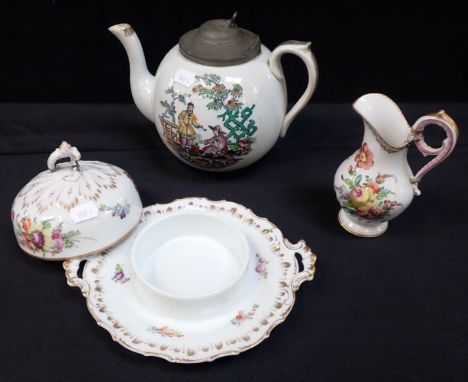 A DRESDEN COVERED BUTTER DISH a similar Dresden jug (both with old repairs) and a Staffordshire teapot with Chinoiserie scene