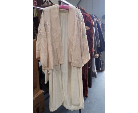 A VINTAGE CREAM EMBROIDERED KIMONO together with a similar jacket (2)