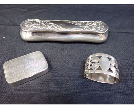 A SILVER DRESSING TABLE BOX in Art Nouveau style, with a silver napkin ring and a continental silver pill box