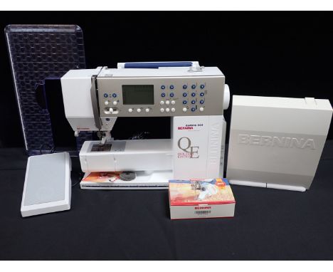 A BERNINA AURORA 440 Q SEWING MACHINE boxed, with carrying case, manual, etc