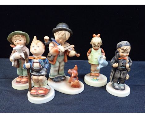 A COLLECTION OF HUMMEL FIGURES (5)