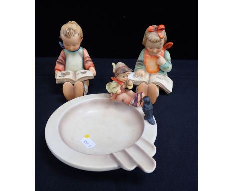 A PAIR OF GOEBEL HUMMEL FIGURES of a boy and girl reading 15cm high, and a boy and bird ashtray (3)