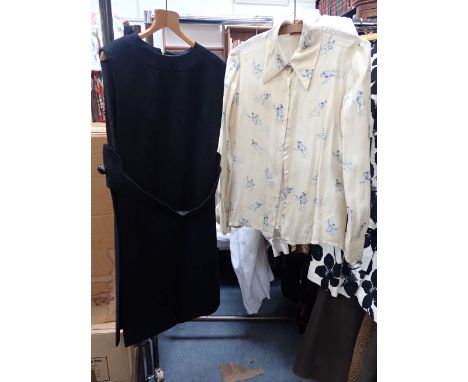 PIERRE CARDIN: A BLACK VINTAGE TABARD together with a vintage French silk cream and black printed blouse (2)