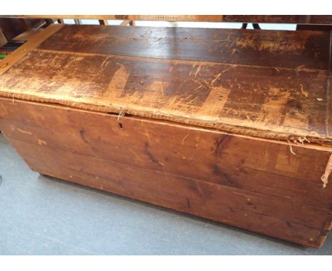 AN OLD PINE TRUNK 115cms wide, and a pair of tapestry curtains