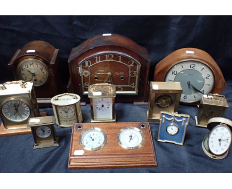 A COLLECTION OF CLOCKS including a 1930s mantel clock with Westminster chime