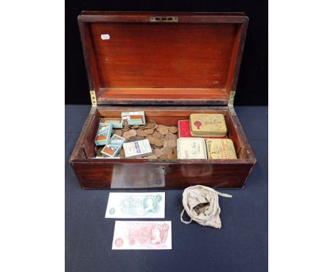 A VICTORIAN BOX formerly a writing slope, containing British coins, mostly old pennies and cigarette packets with some cigare