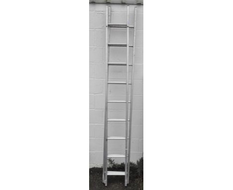 A double metal ladder, each stave approx 240cm long
