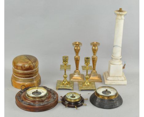 A group of collectables, including two pairs of brass candlesticks, three barometers and a lamp