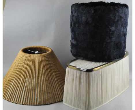 Four assorted lamp shades, including a feathered example, largest 59cm diameter
