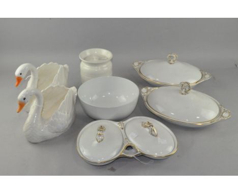 A group of three Royal Worcester porcelain tureens, together with a pair of swan dishes and a Wedgwood lidded pot