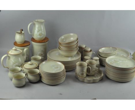 A large collection of Denby 'Daybreak' ceramics, including teacups and a teapot