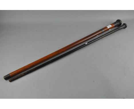 A silver mounted walking cane, 91cm long; together with a white metal mounted stick