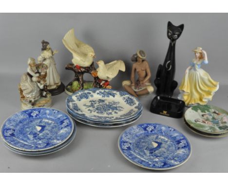 A box of assorted ceramics, including a cat, Nao figure of a lady and more