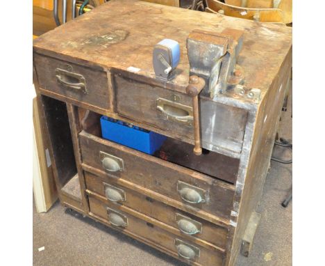 An oak work bench, comprising two short and four long drawers (one missing) with attached  'Record no 3' vice, bench 85cm wid