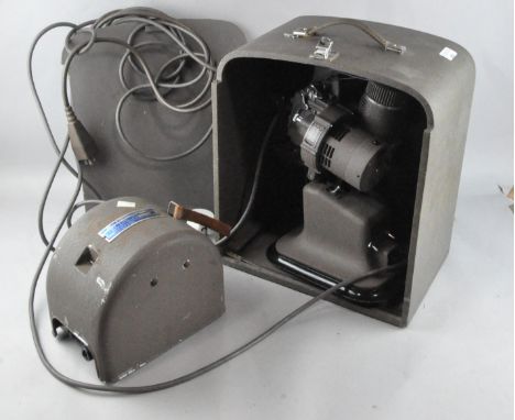 A Bell and Howell Model 615 projector and transformer, cased