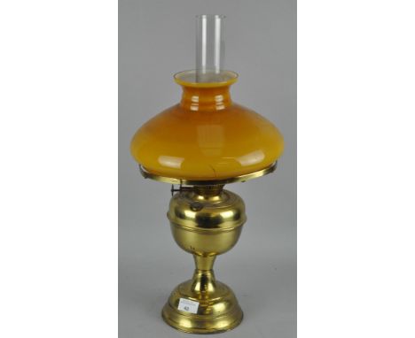 A vintage brass oil lamp, by Duplex, with glass shade and funnel, 53cm high