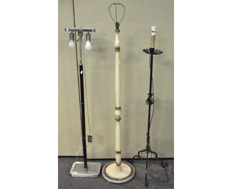 Two metal and one wooden standard lamp (3), tallest measures 156cm high