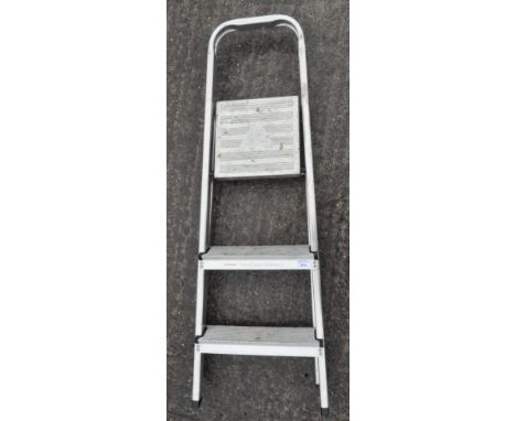 Three metal step ladders