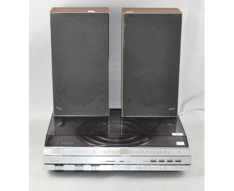 A Bang and Olufsen Beocentre 2800 record player, together with a pair of Beozox S25 speakers