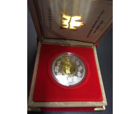 COINS : CANADA 1999 $15 in Chinese design in proof condition 92.5% silver with 24k gold plating to centre, in presentation bo