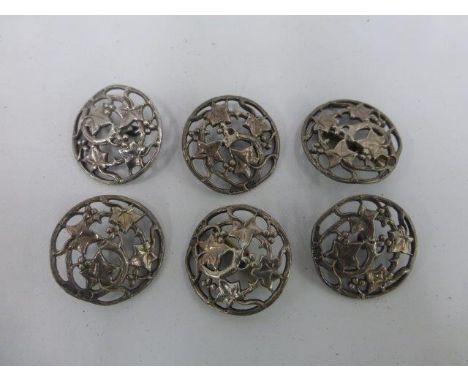 A set of six silver buttons with pierced decoration. Maker William Hutton & Sons (1896-1930). Birmingham 1902.