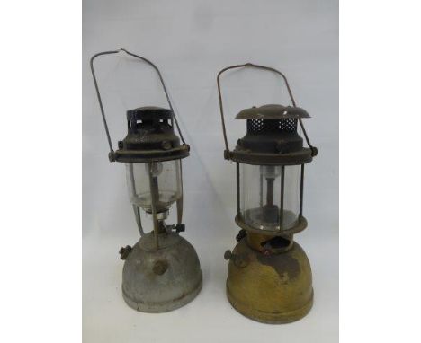 A military 1949 Bialaddin storm lantern and one other.