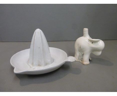 A late 19th /early 20th Century ceramic lemon/orange squeezer, and a Nut Brown pie funnel Rd No. 860928, in the form of an el