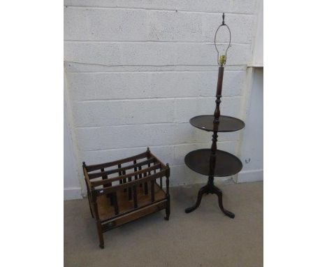 A mahogany Cantebury with single drawer raised on castors, and a mahogany two tier dumb waiter tripod standard lamp.