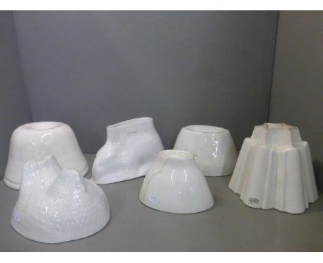 Six assorted 19th Century and later ceramic jelly moulds, including Shelley, one in the form of a rabbit, and another in the 