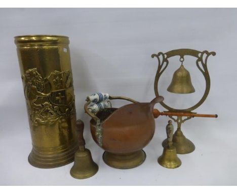 An assortment of brassware including a school bell, a stick stand, a gong in the form of a bell etc.