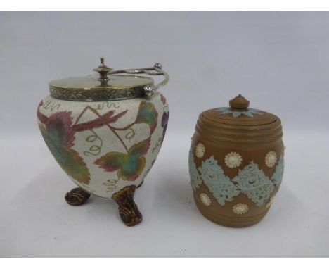 A Royal Doulton tobacco jar, and a 19th Century ceramic biscuit barrel with dolphin feet and Rd No. 58522.