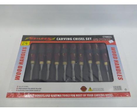 A Neilsen 12 piece carving chisel set.