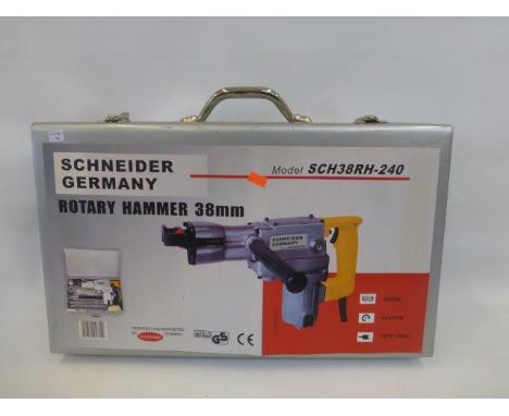 A cased Schneider Germany Rotary Hammer Drill 38mm - unused.
