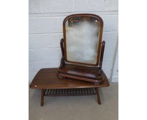 A Victorian mahogany toilet mirror, and an Ercol coffee table with undertier.