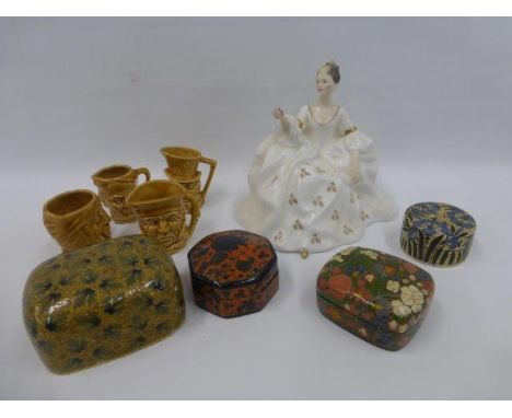 Four papier mache lidded trinket boxes, four Lancaster and Sandland Ltd treacle glazed miniature Toby jugs, and a Royal Doult