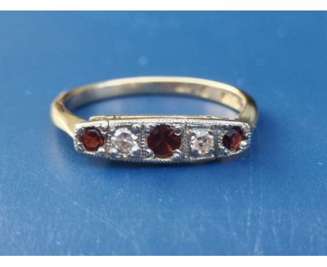 A small ruby &amp; diamond five stone ring - 18ct &amp; PLAT.  Finger size L.