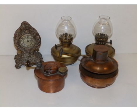 A small EP alarm clock, 4.5" high, a Boyd's Patent oil burner, one other and a small pair of oil lamps. (5)