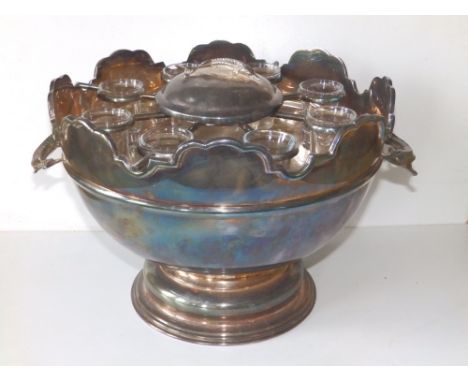 An EP caviar &amp; vodka stand of monteith form having a pair of sturgeon handles, eight shot glasses arranged around a centr