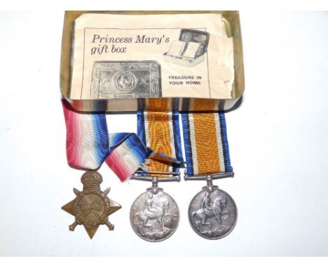 A 1914 brass Princess Mary's gift box Christmas ration tin, together with a WWI War Medal awarded to W. Tompkins FMN.MFA., a 