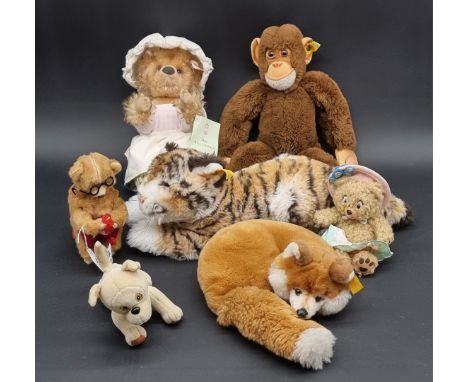 Steiff:&nbsp;four various examples, to include Miss Tiggy-Winkle; together with three other soft toys, and a clockwork knitti